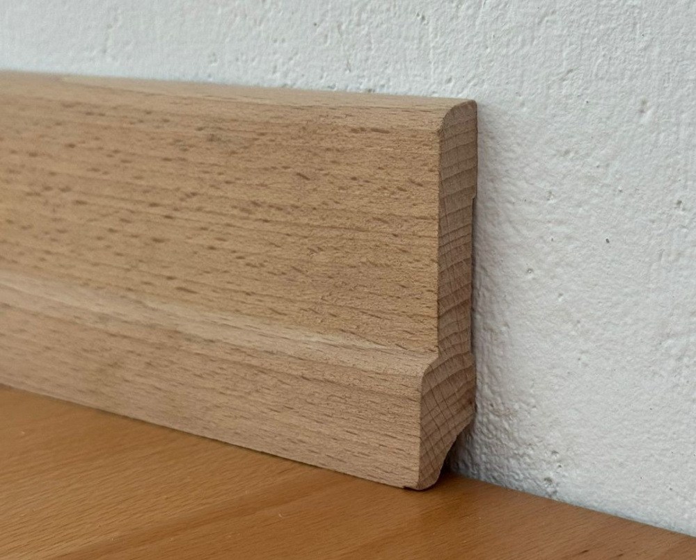 Плинтус массив Бук помешанный сапожок без покрытия 75х17мм